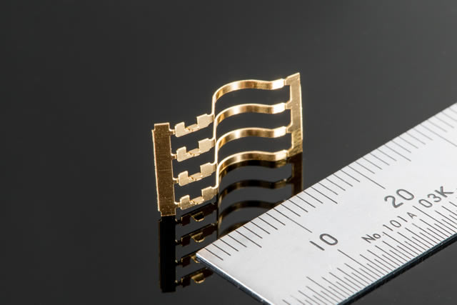 What is the difference between sheet metal processing and precision metal stamping?